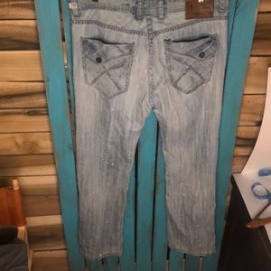 Akoo distressed jeans size 38x33 faux flap pockets white spots and holes